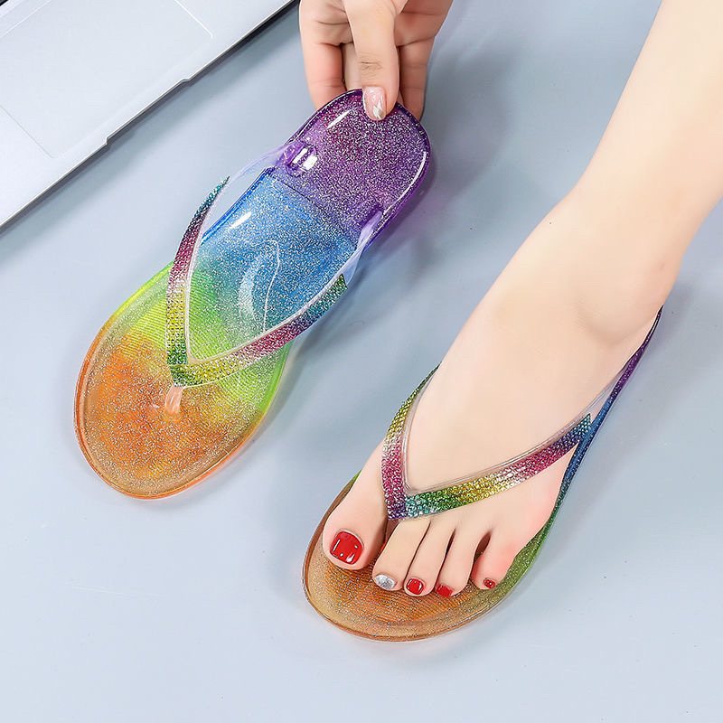 2024 Sommar Flip Flops Kvinnors Nya Mode Godis Färg Platt Kristall Nypa Sandaler Tofflor Skor