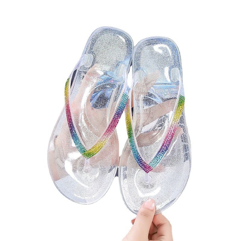 2024 Sommar Flip Flops Kvinnors Nya Mode Godis Färg Platt Kristall Nypa Sandaler Tofflor Skor